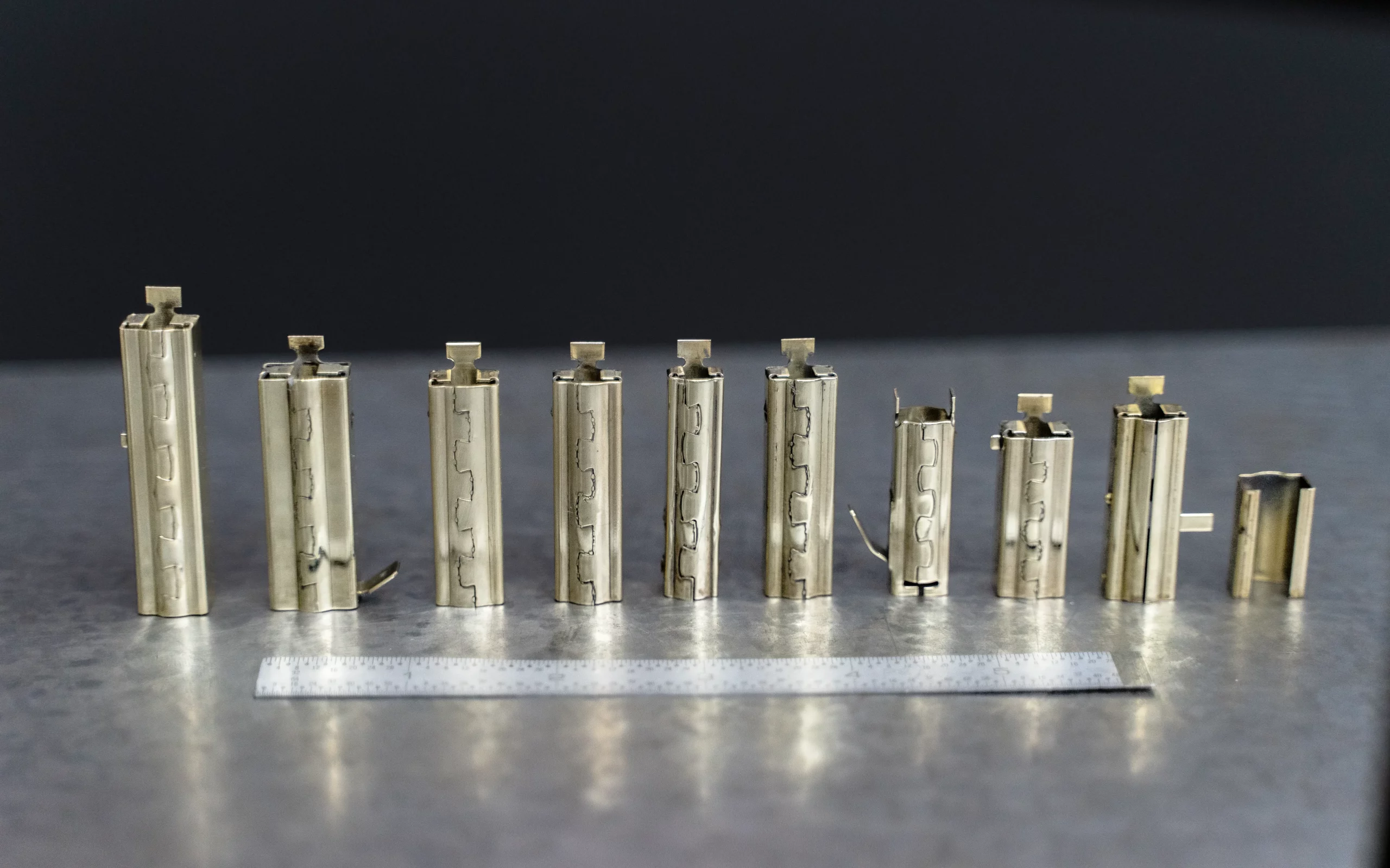 Manufactured metal components displayed in the Ampex product gallery