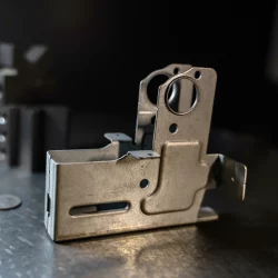 Precision metal formed components for industrial manufacturing applications