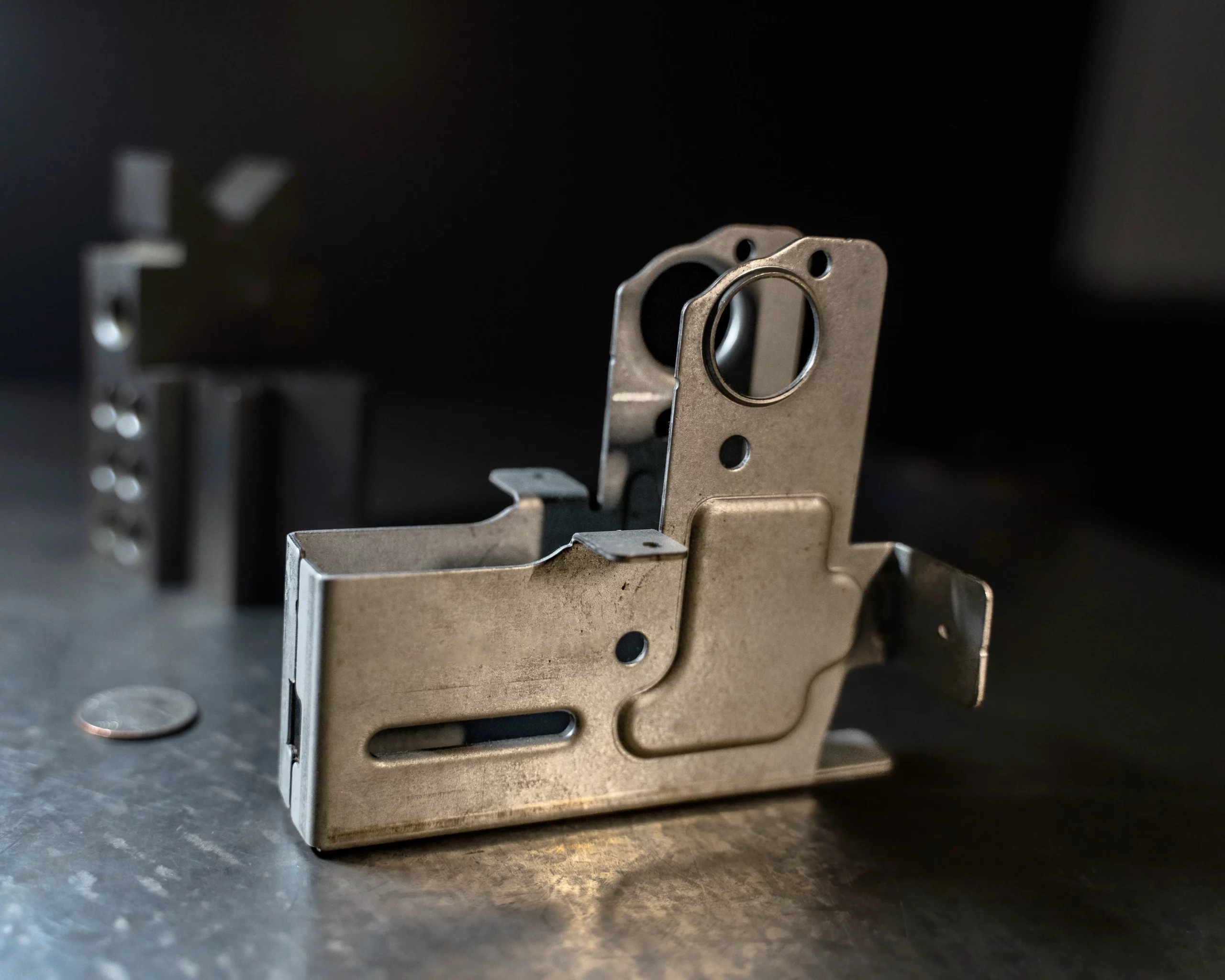 Precision metal formed components for industrial manufacturing applications